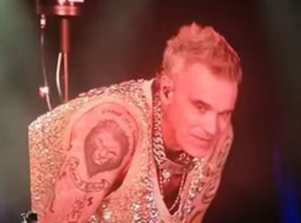 Robbie Williams anulon koncertin: Nuk e kam nga mosha, por nga Covid