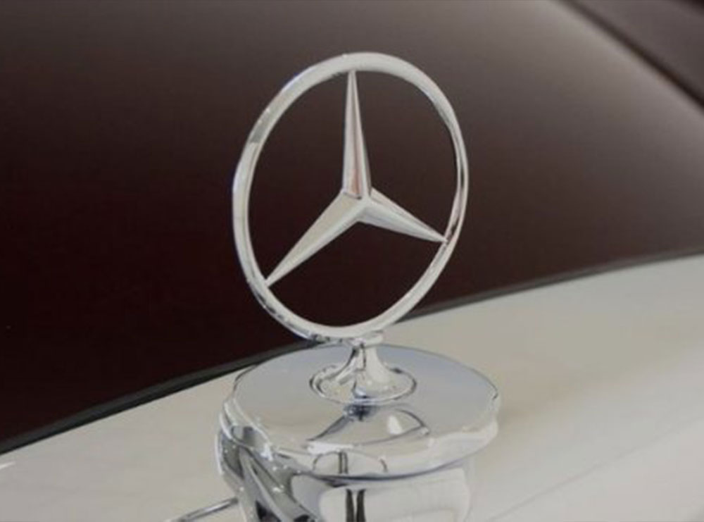 Historia pas logos së Mercedes Benz